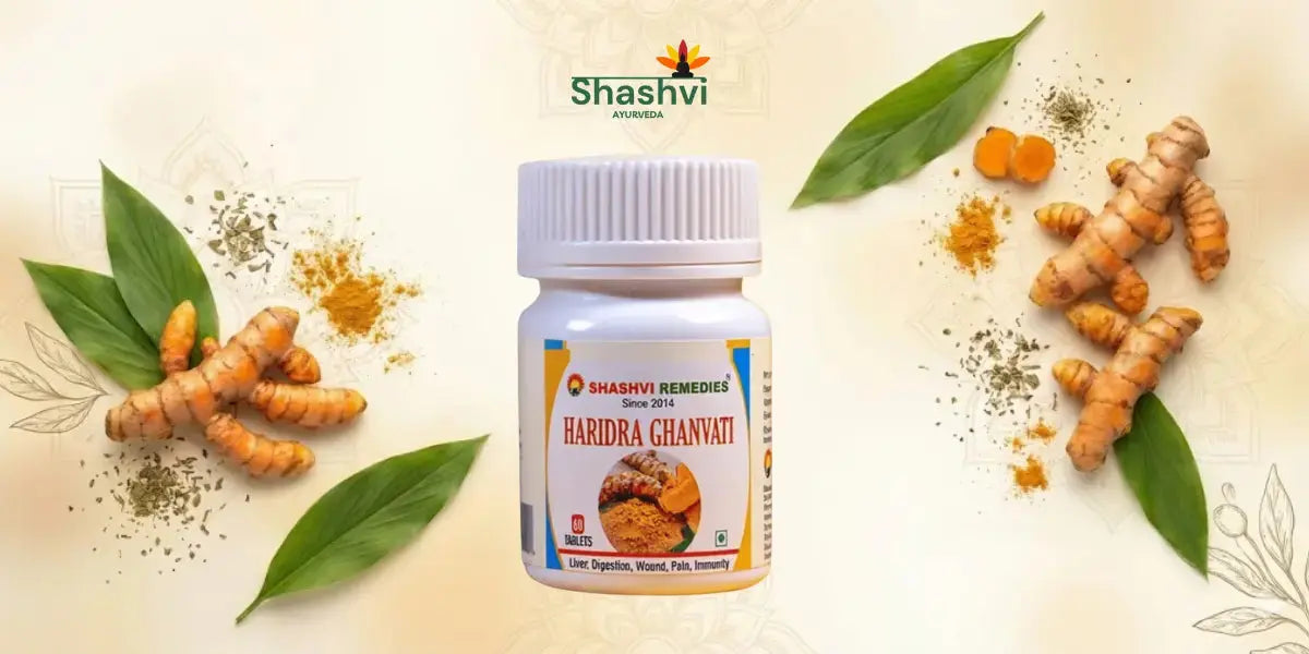 Fresh turmeric roots (Haridra) with golden orange color and green leaves on warm background - Ayurvedic healing herb for immunity and inflammation