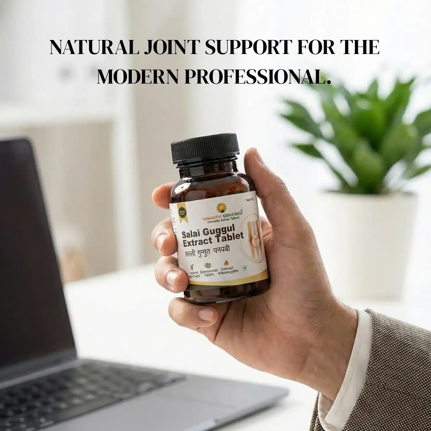 Hand holding a bottle of Salai Guggul Extract Tablet with text 'Natural Joint Support for the Modern Professional' in an office setting.