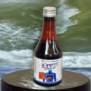 Shahsvi Liv-100 Syrup Sugar-free bottle against oceanic backdrop for liver health